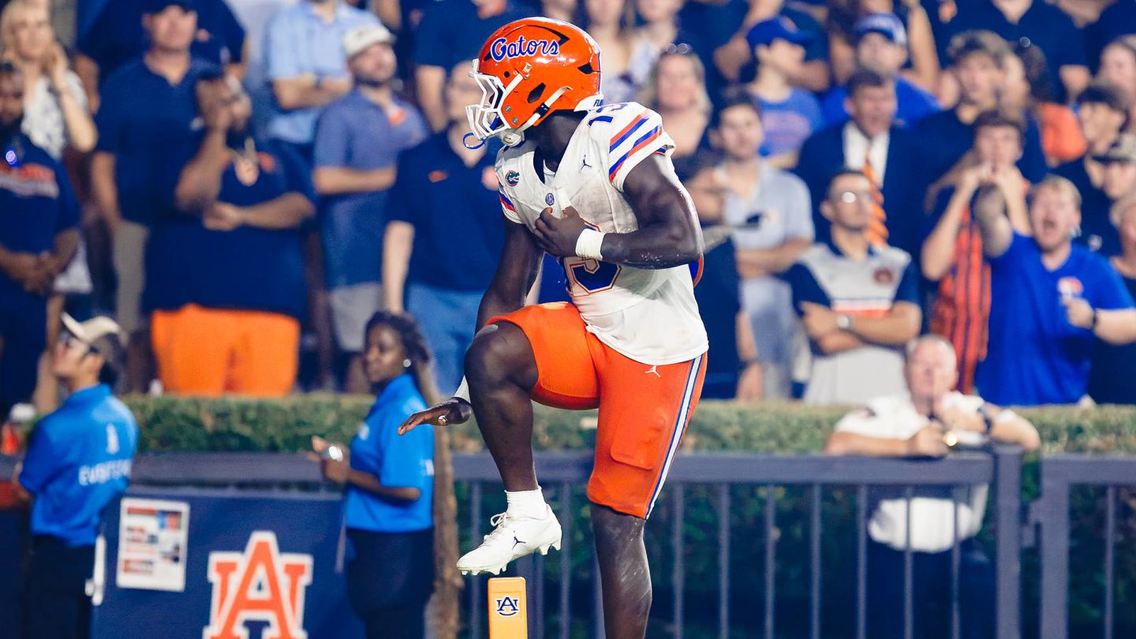 Jadan Baugh posing in the end zone at Auburn in the Florida white road jersey
